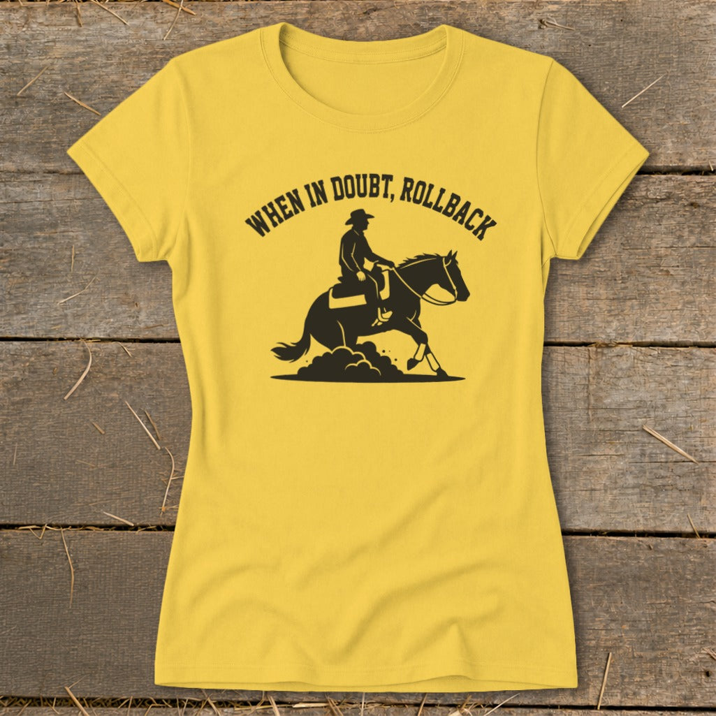 Yellow t-shirt with black graphic of a person riding a horse and text "When in doubt, rollback".