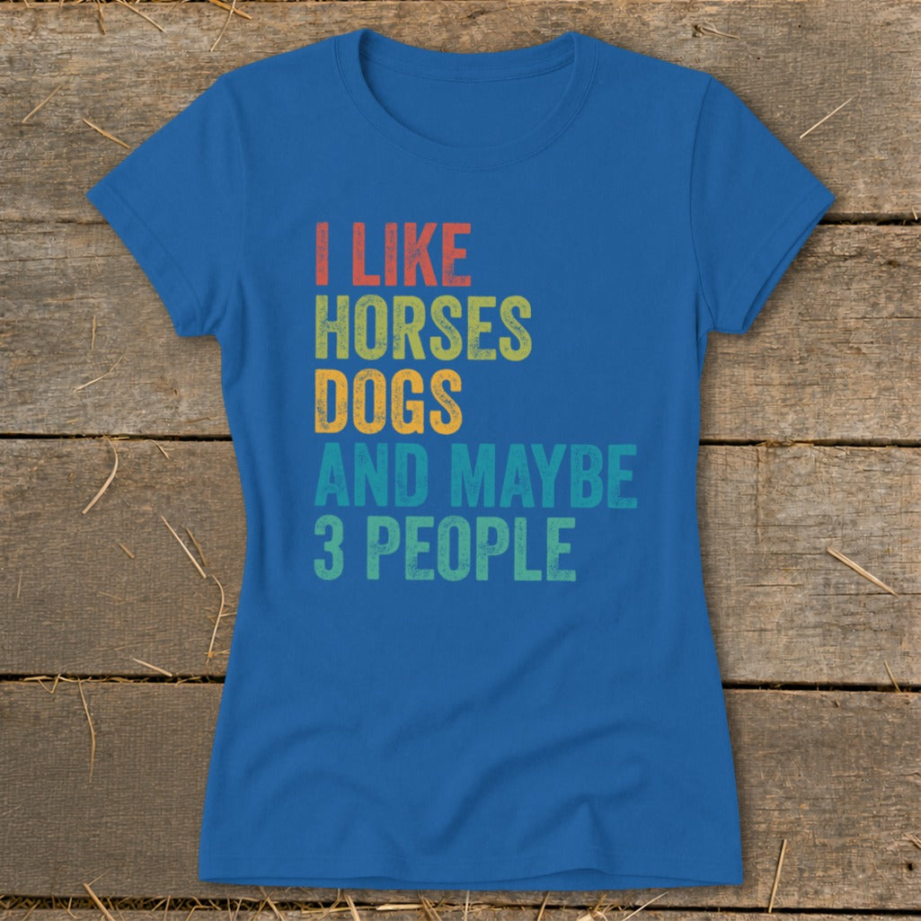 Blue t-shirt with text "I LIKE HORSES DOGS AND MAYBE 3 PEOPLE".