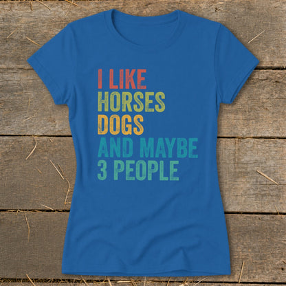 Blue t-shirt with text "I LIKE HORSES DOGS AND MAYBE 3 PEOPLE".