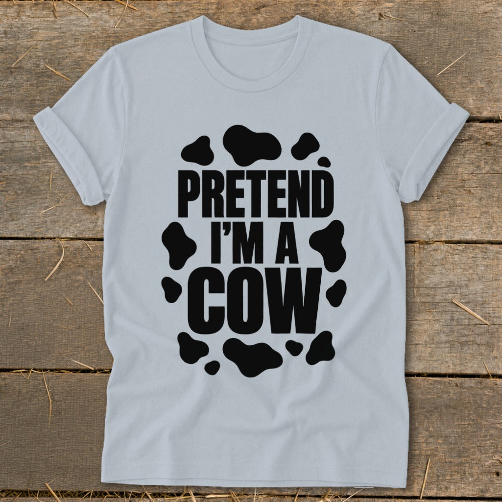 Light grey t-shirt with black "PRETEND I'M A COW" text and cow spots.