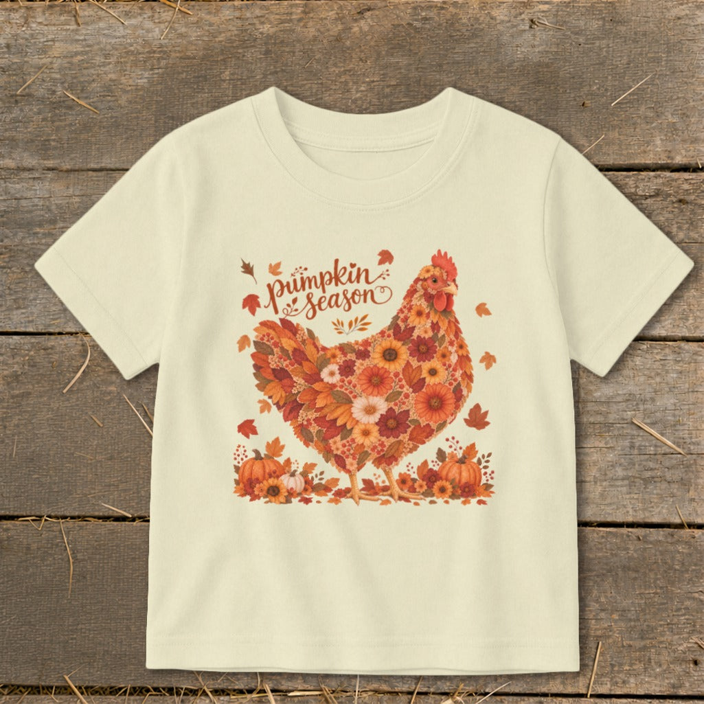 Cream t-shirt with a chicken made of autumn leaves and flowers, text "pumpkin season".