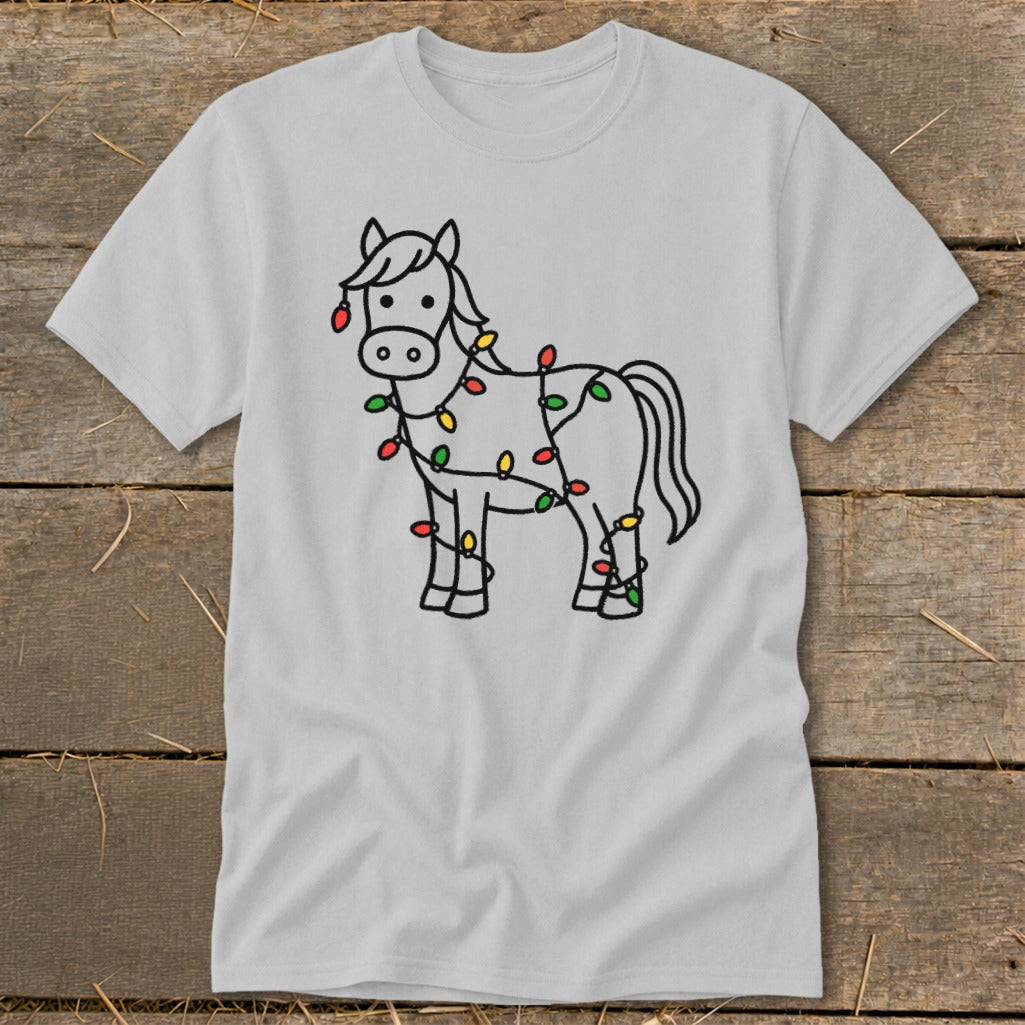 Light gray t-shirt with a drawing of a horse wrapped in colorful Christmas lights.
