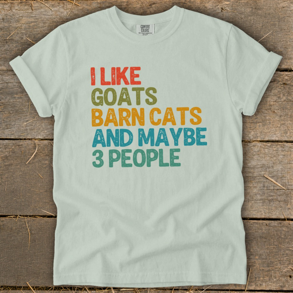 Light green t-shirt with text "I LIKE GOATS BARN CATS AND MAYBE 3 PEOPLE".