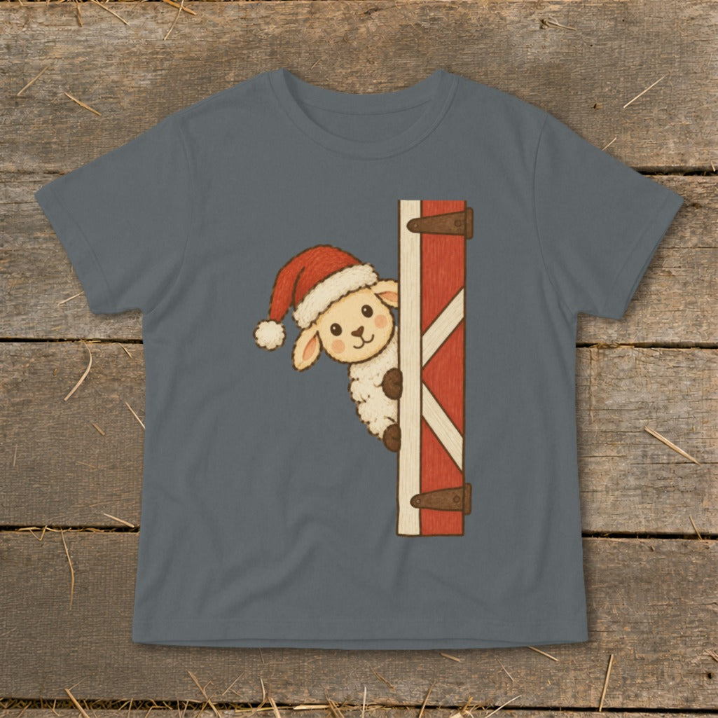 Sheep wearing Santa hat peeking from barn door graphic on grey t-shirt.