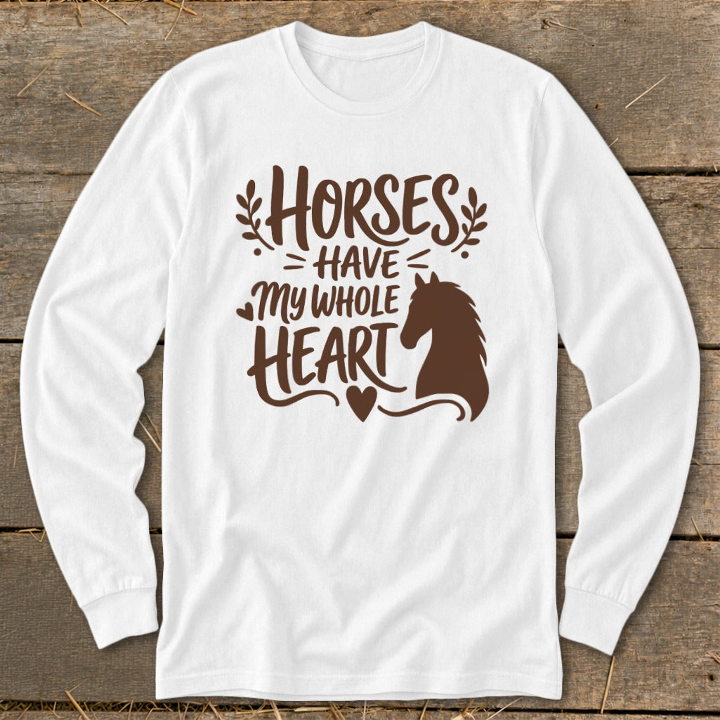 White long-sleeve shirt with brown text and horse graphic reading "Horses Have My Whole Heart".