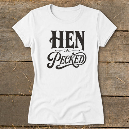 White t-shirt with "HEN Pecked" text in black, decorative font.