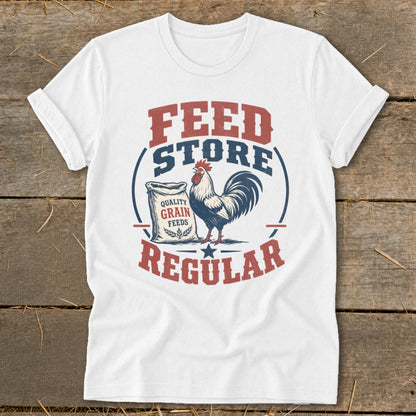 White t-shirt with "Feed Store Regular" text, a rooster, and a bag of grain feeds.