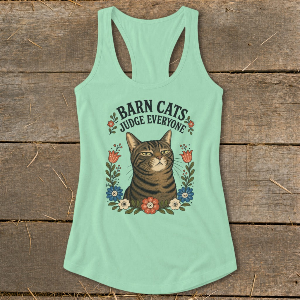Mint green tank top with a tabby cat surrounded by flowers and the text "Barn Cats Judge Everyone".