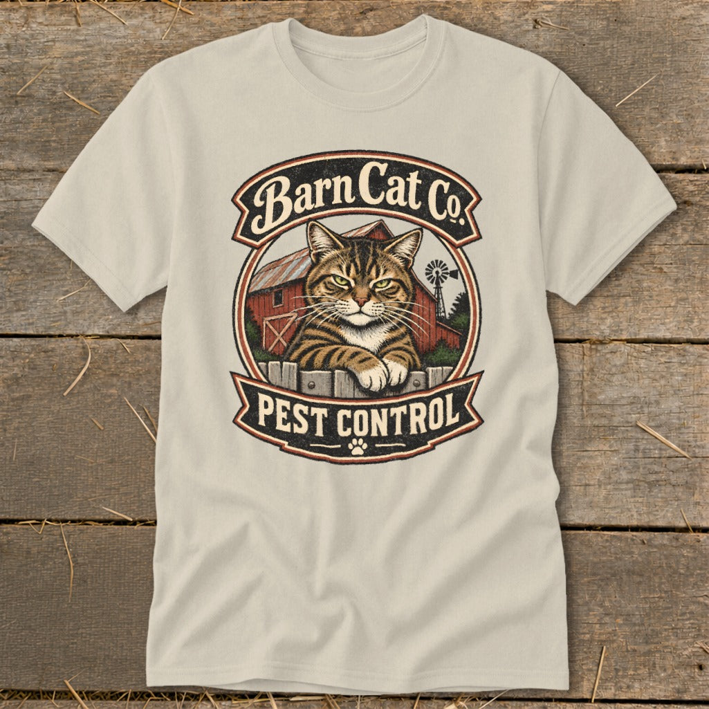 Light beige t-shirt featuring a vintage logo with a tabby cat and Barn Cat Co Pest Control text.