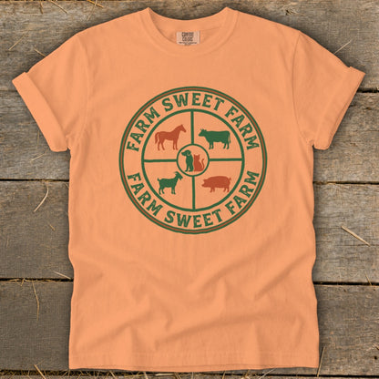 Orange t-shirt with "FARM SWEET FARM" text and farm animals in a circular design.