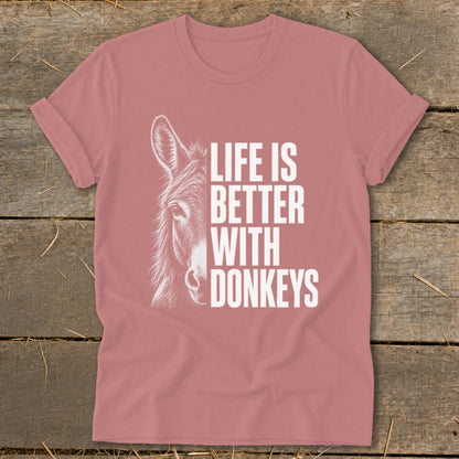 Pink t-shirt with a sketch of a donkey and text "Life is Better With Donkeys".