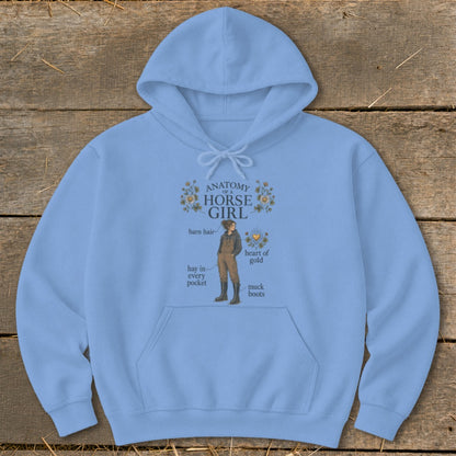Light blue hoodie with "Anatomy of a Horse Girl" graphic and humorous labels.