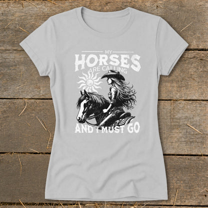 Gray t-shirt with "My Horses Are Calling And I Must Go" text and horse rider graphic.