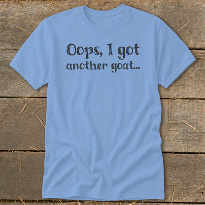 Light blue t-shirt with "Oops, I got another goat..." text.