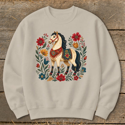 Light beige sweatshirt with a stylized horse surrounded by colorful flowers.