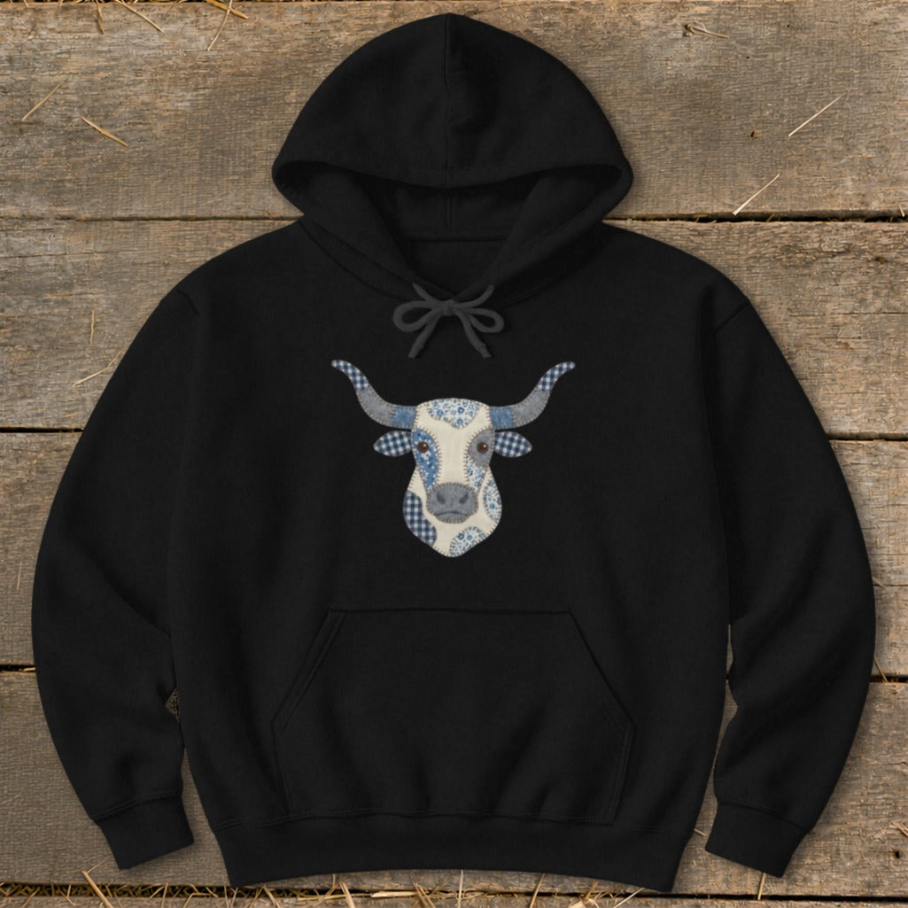 Black hoodie with a blue and white patchwork bull head graphic.
