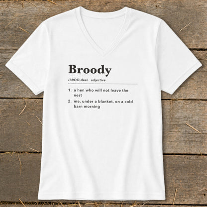 White v-neck t-shirt with "Broody" definition: "a hen who will not leave the nest" or "me, under a blanket, on a cold barn morning".