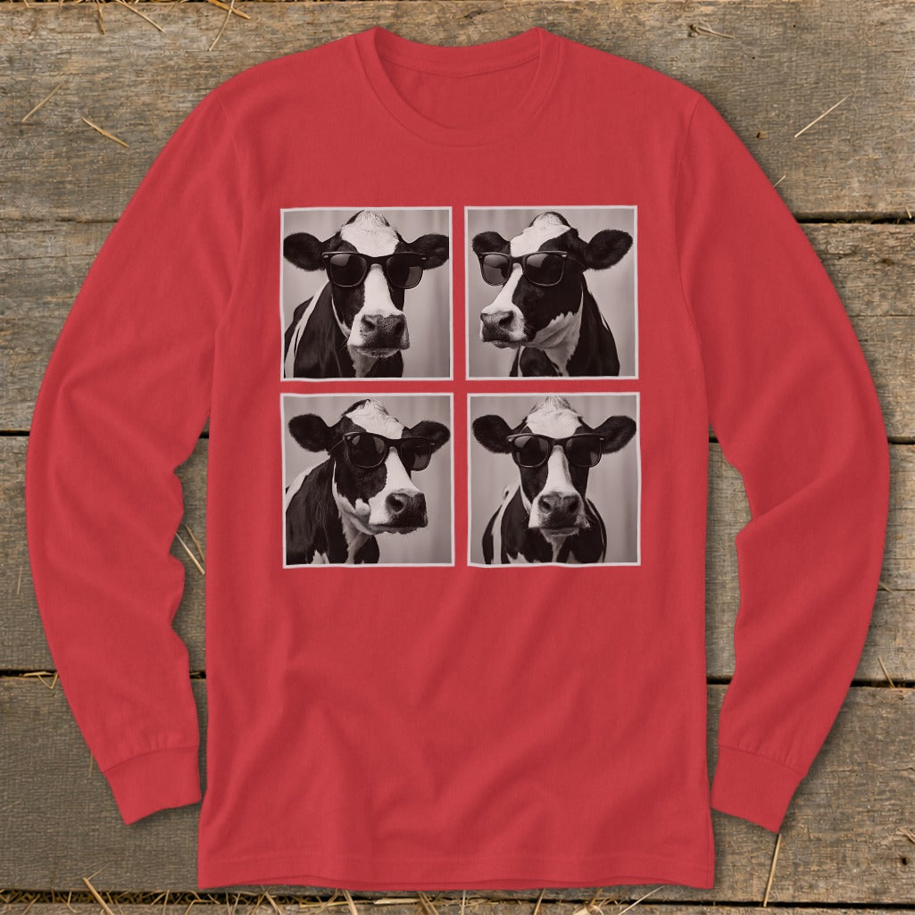 Four black and white cow portraits wearing sunglasses on a red long-sleeve shirt.