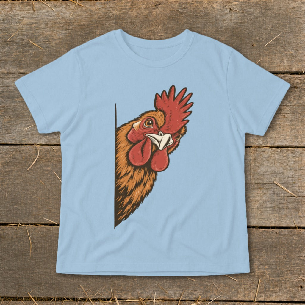 Illustration of a brown rooster peeking around a corner on a light blue t-shirt.