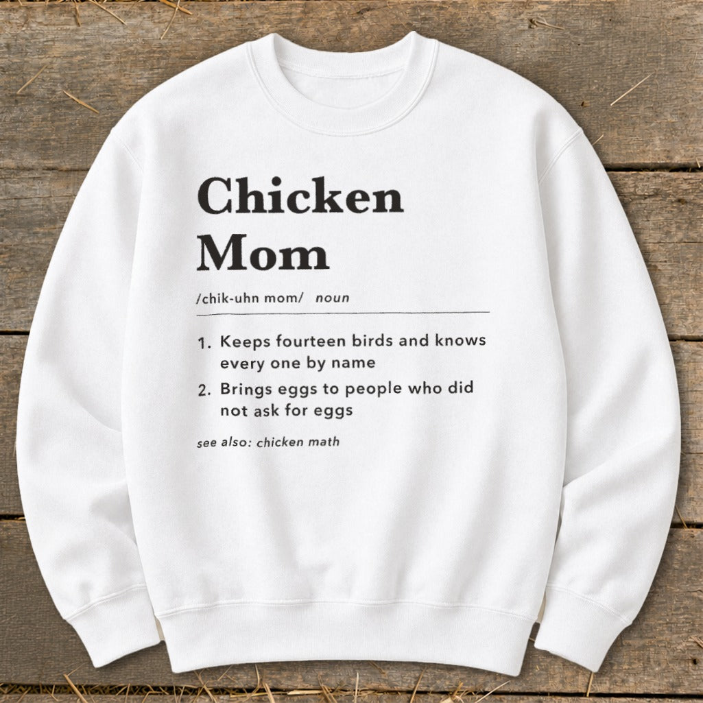 White sweatshirt with "Chicken Mom" definition and humorous bullet points.