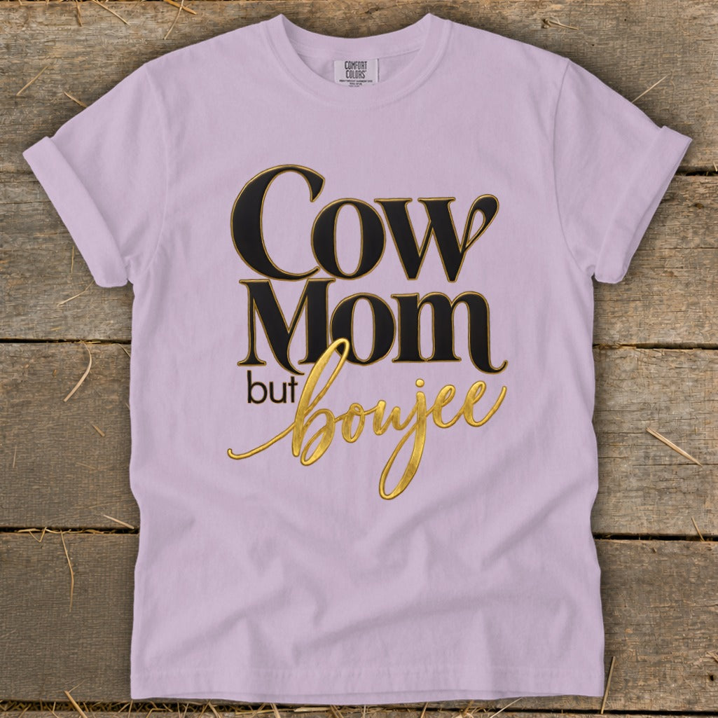 Lilac t-shirt with "Cow Mom but boujee" text in black and gold.