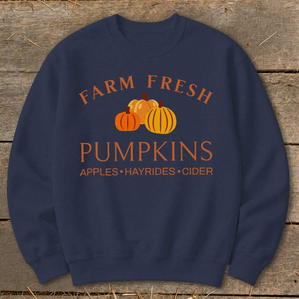 Navy sweatshirt with "Farm Fresh Pumpkins" and autumnal icons.