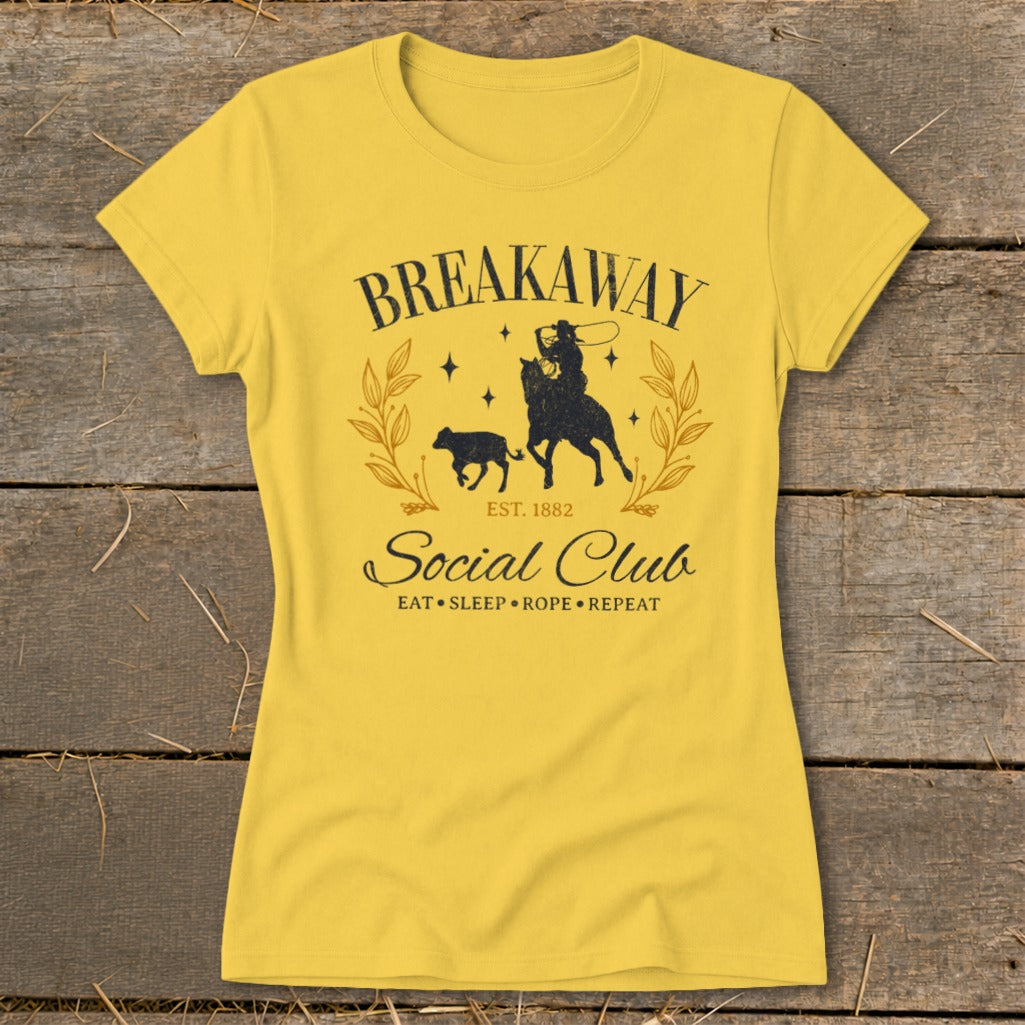 Yellow t-shirt with "Breakaway Social Club Eat Sleep Rope Repeat" graphic.