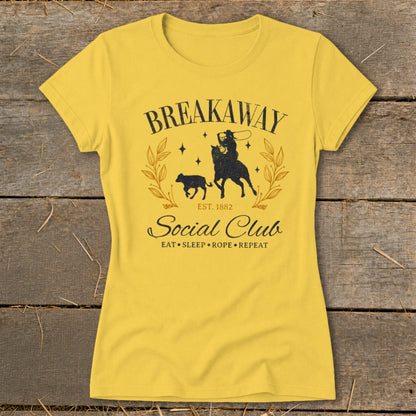 Yellow t-shirt with "Breakaway Social Club Eat Sleep Rope Repeat" graphic.