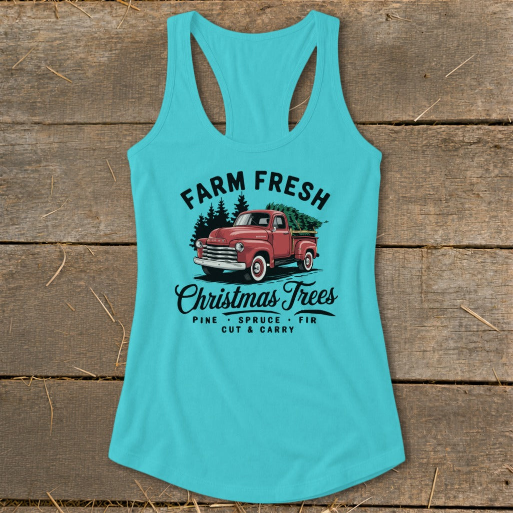 Turquoise tank top with "Farm Fresh Christmas Trees" graphic of a red truck.