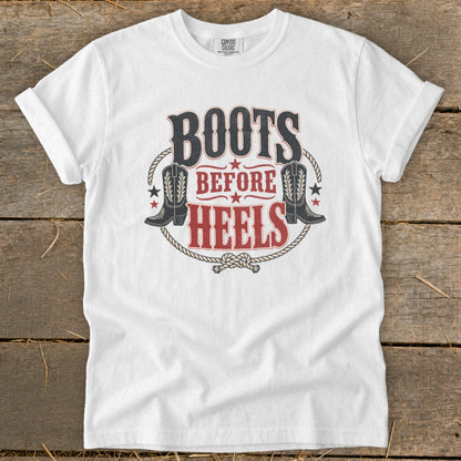 White t-shirt with "Boots Before Heels" text and cowboy boot graphics.
