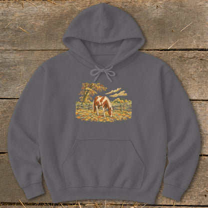Grey hoodie with a painted graphic of a brown and white horse in an autumn field.