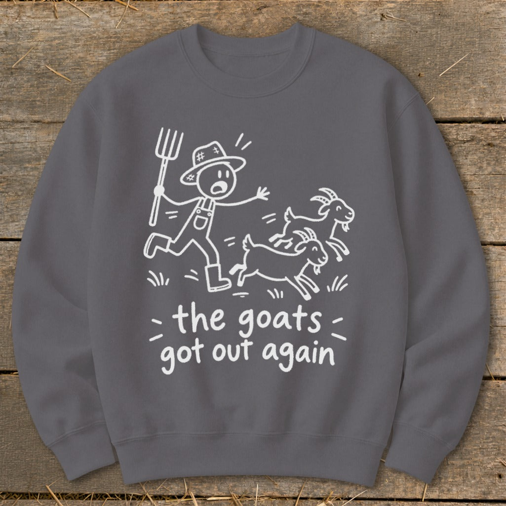 Crewneck sweatshirt with white cartoon drawing of farmer chasing goats and text "the goats got out again".