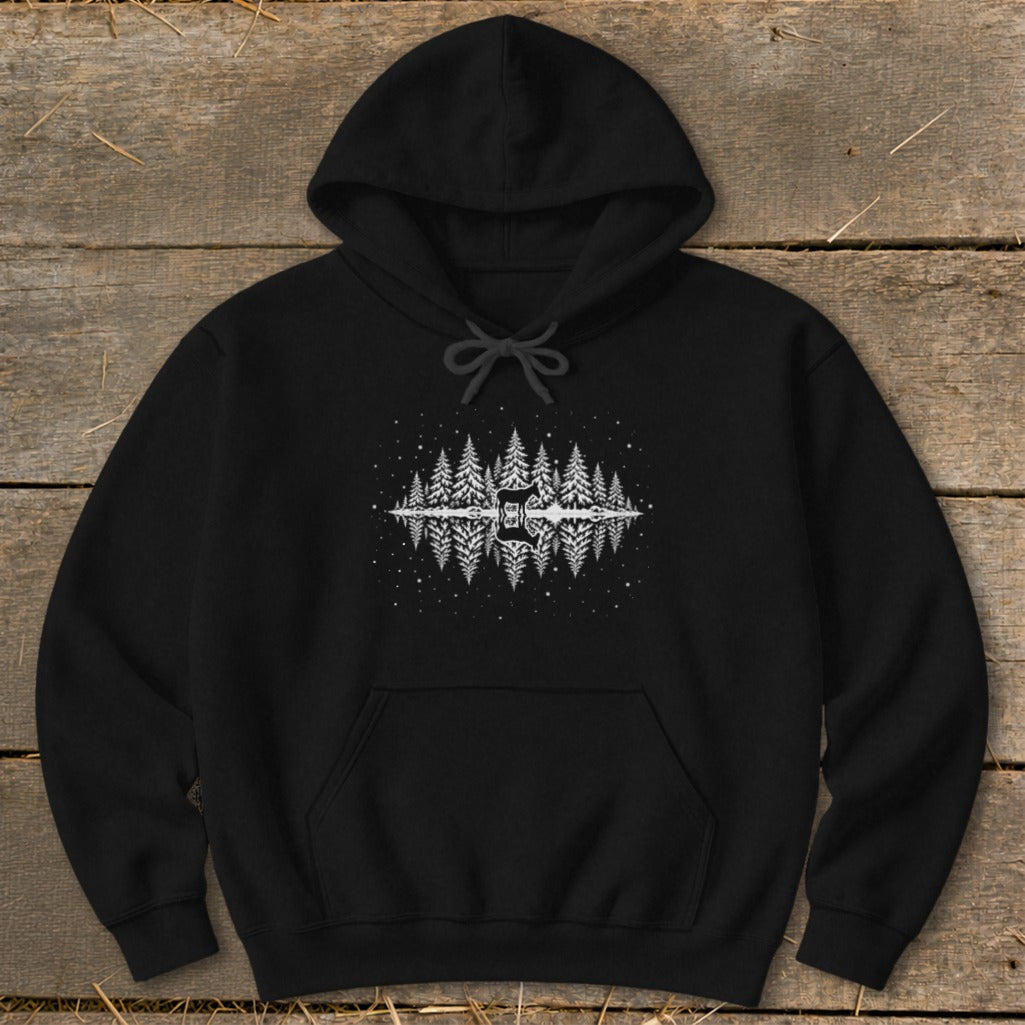 Black hoodie with a reflected forest and stars graphic.