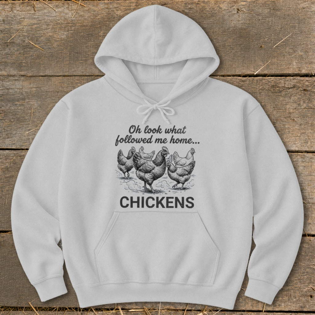 White hoodie with sketch of chickens and text "Oh look what followed me home... CHICKENS"