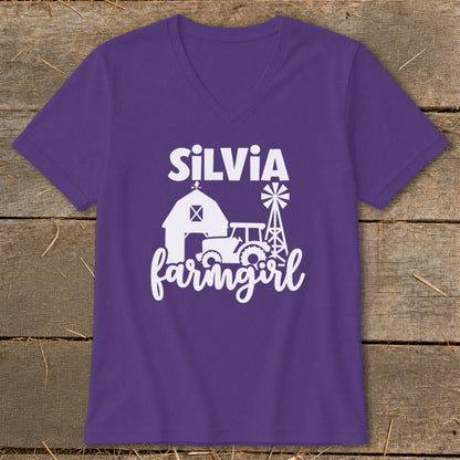 Purple t-shirt with white "Silvia Farmgirl" text and farm graphic.