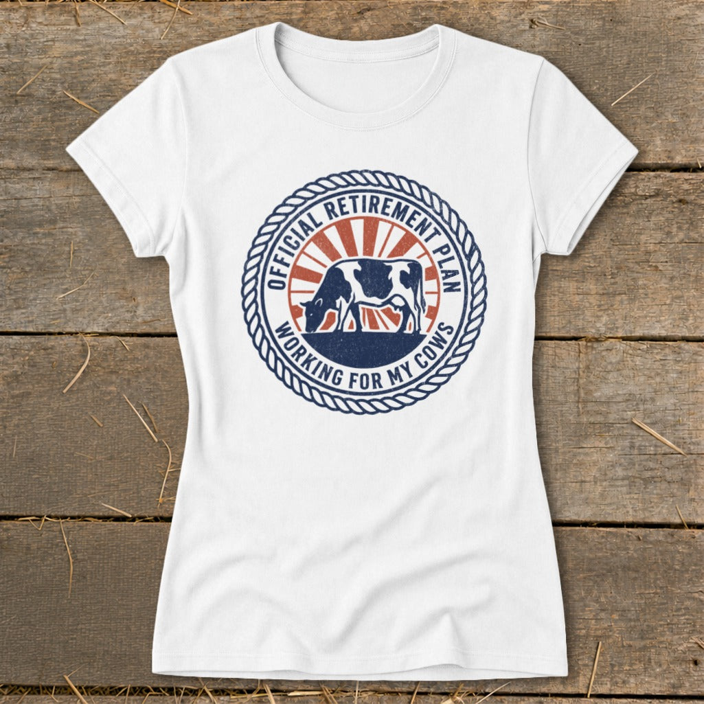 White t-shirt with "Official Retirement Plan Working for My Cows" and cow graphic.