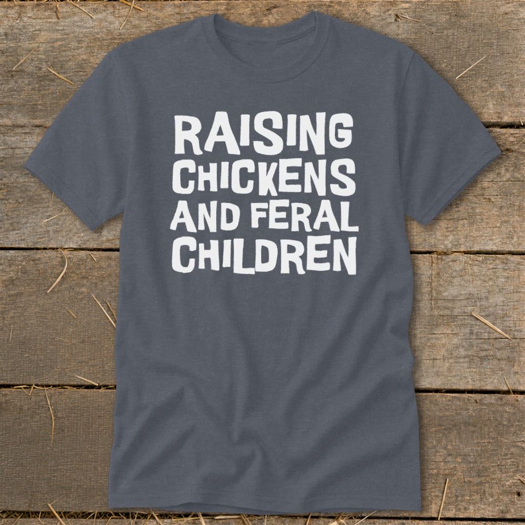 Dark gray t-shirt with white text reading "Raising Chickens and Feral Children."