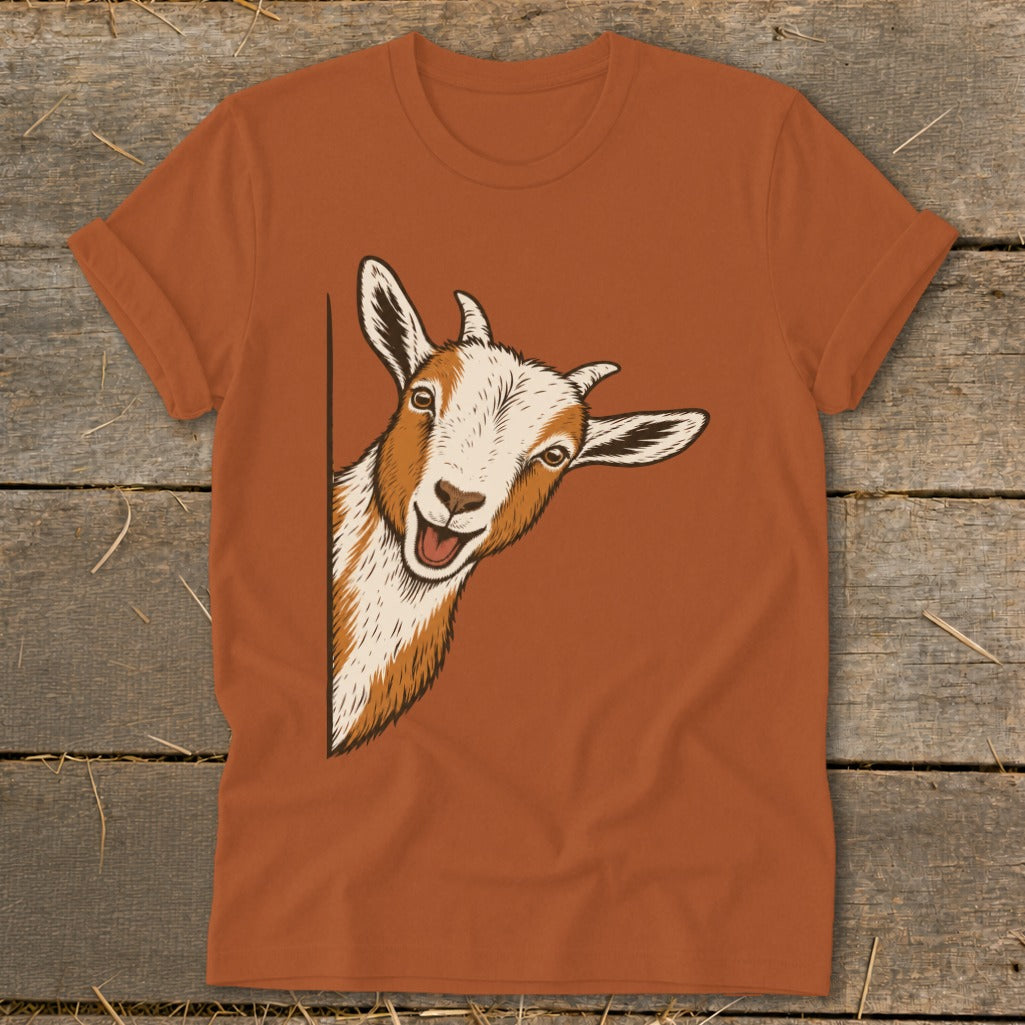 T-shirt with an illustration of a peeking goat with a cheerful expression.