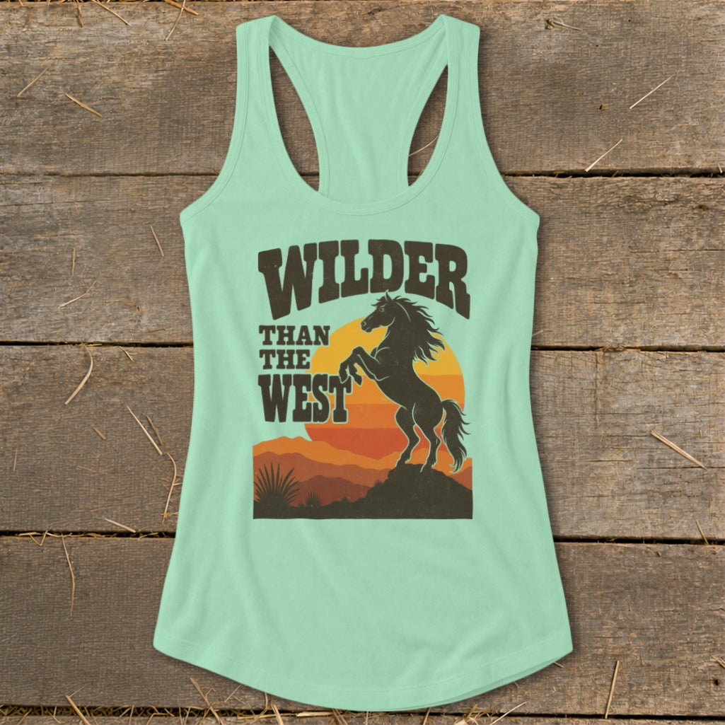 Mint green tank top with "WILDER THAN THE WEST" and a rearing horse graphic.