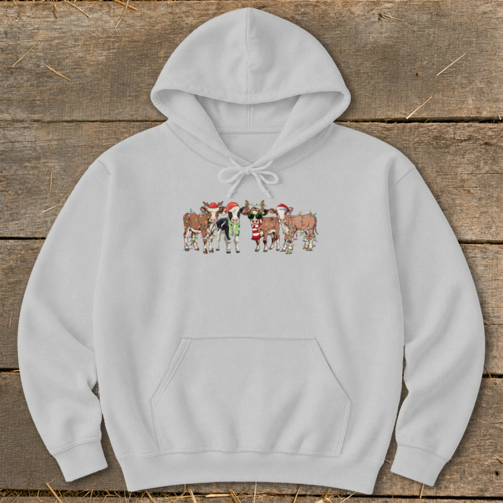 Gray hoodie with Christmas cows wearing Santa hats and lights.