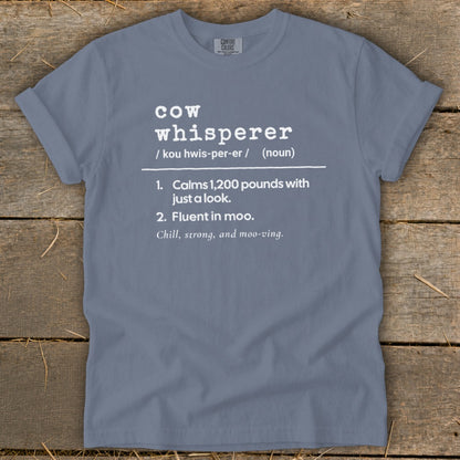 Blue t-shirt with "cow whisperer" definition in white text.