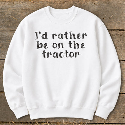 White crewneck sweatshirt with black text "I'd rather be on the tractor".