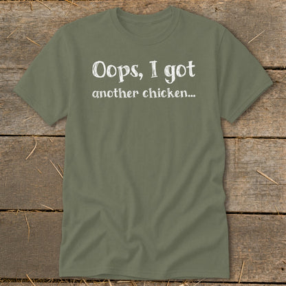 Olive t-shirt with white text that reads "Oops, I got another chicken...".