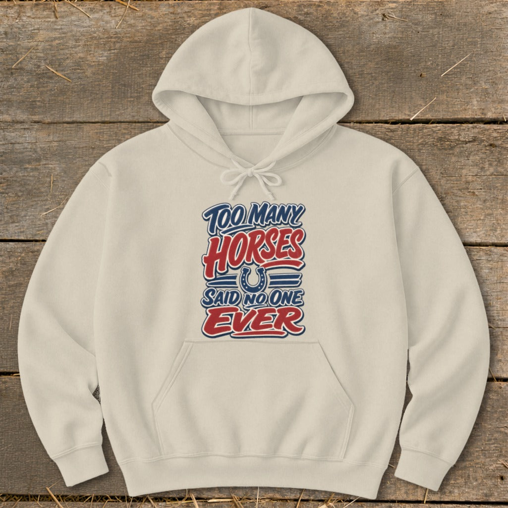 Cream hoodie with text "Too Many Horses Said No One Ever" and a horseshoe graphic.
