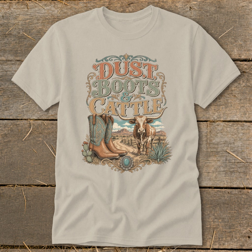 T-shirt with "Dust Boots & Cattle" graphic featuring cowboy boots, longhorn, and desert landscape.