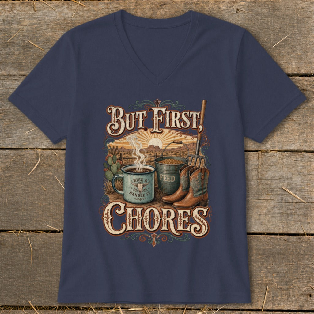 Navy v-neck shirt with "But First, Chores" text and western-themed graphic.