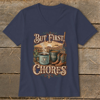 Navy v-neck shirt with "But First, Chores" text and western-themed graphic.