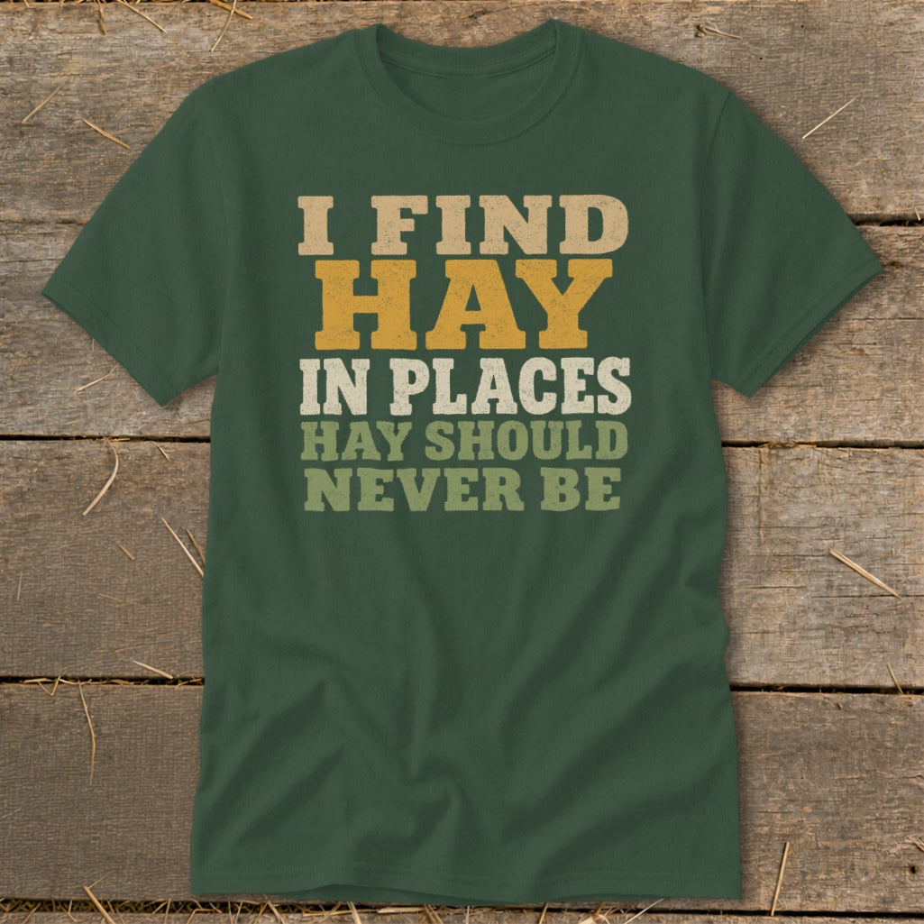 Green t-shirt with text "I FIND HAY IN PLACES HAY SHOULD NEVER BE".