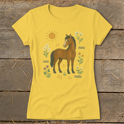 Yellow t-shirt with a brown horse, sun, and wildflowers illustration.
