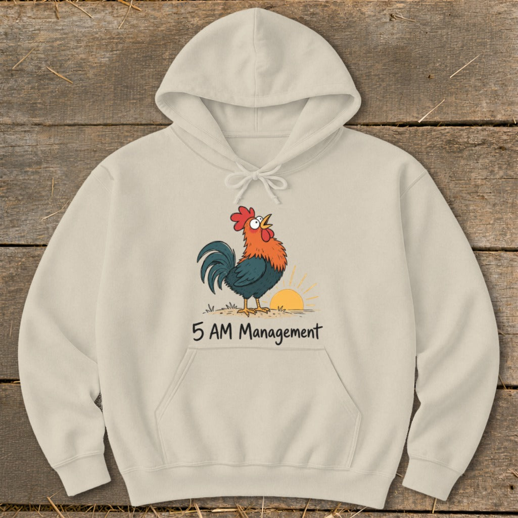 Light beige hoodie with a rooster crowing at sunrise graphic and "5 AM Management" text.